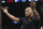Former boxer Mike Tyson gestures to the crowd before a WBC heavyweight title boxing match between Deontay Wilder and Artur Szpilka, of Poland, Saturday, Jan. 16, 2016, in New York.  (AP Photo/Frank Franklin II)