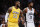 Los Angeles Lakers' LeBron James (23) and Los Angeles Clippers' Paul George (13) in an NBA basketball game between Los Angeles Lakers and Los Angeles Clippers, Wednesday, Dec. 25, 2019, in Los Angeles. The Clippers won 111-106. (AP Photo/Ringo H.W. Chiu)