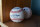 LAKELAND, FL - MARCH 01:  A detailed view of a pair of official Rawlings Major League Baseball baseballs with the imprinted signature of  Robert D. Manfred Jr., the Commissioner of Major League Baseball, sitting in the dugout prior to the Spring Training game between the New York Yankees and the Detroit Tigers at Publix Field at Joker Marchant Stadium on March 1, 2020 in Lakeland, Florida. The Tigers defeated the Yankees 10-4.  (Photo by Mark Cunningham/MLB Photos via Getty Images)
