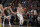 Denver Nuggets forward Mason Plumlee (7) and Milwaukee Bucks forward Ersan Ilyasova (7) in the second half of an NBA basketball game Monday, March 9, 2020, in Denver. The Nuggets won 109-95. (AP Photo/David Zalubowski)
