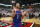FILE - In this March 7, 2020, file photo, Kansas' Devon Dotson (1) celebrates after an NCAA college basketball game against Texas Tech in Lubbock, Texas. Kansas finished the season No. 1 in The Associated Press college basketball poll, receiving 63 of 65 first-place votes from a national media panel Wednesday, March 18, 2020. (AP Photo/Brad Tollefson, FIle)