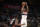 Washington Wizards guard Bradley Beal (3) shoots against Miami Heat forward Bam Adebayo (13) during the second half of an NBA basketball game, Sunday, March 8, 2020, in Washington. The Heat won 100-89. (AP Photo/Nick Wass)