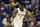 New Orleans Pelicans forward Zion Williamson (1) reacts after a basket in the first half of an NBA basketball game in New Orleans, Sunday, March 1, 2020. (AP Photo/Rusty Costanza)