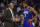 Los Angeles Clippers forward Kawhi Leonard, right, speaks with head coach Doc Rivers after being taken out of the game during the second half of an NBA basketball game against the New Orleans Pelicans in Los Angeles, Sunday, Nov. 24, 2019. The Clippers won 134-109. (AP Photo/Kelvin Kuo)