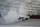 Brad Keselowski (2) does a burnout after winning after winning a NASCAR Cup Series auto race at Bristol Motor Speedway Saturday, May 30, 2020, in Bristol, Tenn. (AP Photo/Mark Humphrey)