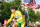 USA's Floyd Landis (Phonak/Swi) carries the US flag during his honour lap after 154.5 km twentieth and last stage of the 93rd Tour de France cycling race from Sceaux-Antony to Paris Champs-Elysees, 23 July 2006.  American Floyd Landis succeeds compatriot Lance Armstrong as the Tour de France champion. Armstrong retired last year after winning seven straight titles.   AFP PHOTO / PASCAL GUYOT (Photo by Pascal GUYOT / AFP) (Photo by PASCAL GUYOT/AFP via Getty Images)