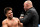 JACKSONVILLE, FL - MAY 09: Henry Cejudo (L) of the United States talks with TV personality Joe Rogan (R) after defeating Dominick Cruz (not pictured) of the United States in the bantamweight title fight against  during UFC 249 at VyStar Veterans Memorial Arena on May 9, 2020 in Jacksonville, Florida. (Photo by Douglas P. DeFelice/Getty Images)