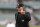FILE - In this Sept. 1, 2019, file photo, home plate umpire Angel Hernandez signals during the fifth inning of a baseball game between the Detroit Tigers and the Minnesota Twins in Detroit. A major league official testified he suggested Hernandez be removed from consideration for the 2015 World Series because he did not think Commissioner Rob Manfred would approve the umpire to work baseballâ€™s premier event. Hernandez sued Major League Baseball in 2017, alleging race discrimination and cited his failure to be assigned to the World Series since 2005 and MLB's failure to promote him to crew chief. (AP Photo/Carlos Osorio, File)