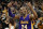 Los Angeles Lakers guard Kobe Bryant gestures to fans as he walks off of the court after an NBA basketball game against the San Antonio Spurs, Saturday, Feb. 6, 2016, in San Antonio. San Antonio won 106-102. (AP Photo/Darren Abate)