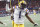 FILE - In this Dec. 7, 2019, file photo, LSU wide receiver Ja'Marr Chase (1) celebrates his touchdown against Georgia during the first half of the Southeastern Conference championship NCAA college football game, in Atlanta. Ja'Marr Chase  was one of three players from LSUâ€™s high-powered offense to earn unanimous first-team all-SEC honors when The Associated Press All-Southeastern Conference football team was announced Monday, Dec. 9, 2019. (AP Photo/John Bazemore, File)