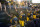 West Virginia quarterback Austin Kendall (12) celebrates with fans at the conclusion of an NCAA college football game against James Madison Saturday, Aug. 31, 2019, in Morgantown, W.Va. (AP Photo/Raymond Thompson)