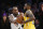 Los Angeles Lakers' LeBron James (23) and Los Angeles Clippers' Kawhi Leonard (2) fight for the ball during an NBA basketball game between Los Angeles Lakers and Los Angeles Clippers, Wednesday, Dec. 25, 2019, in Los Angeles. The Clippers won 111-106. (AP Photo/Ringo H.W. Chiu)