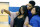 Kentucky NCAA college basketball player Karl Anthony Towns, top, poses with his girlfriend India Gentry, left, and his mother Jacqueline Cruz-Towns after Karl-Anthony announced his intent to place his name in the NBA draft during a news conference at the Joe Craft Center, Thursday, April 9, 2015, in Lexington, Ky. (AP Photo/James Crisp)
