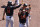 Baltimore Orioles' Anthony Santander, center front, celebrates a two-run home with Rio Ruiz, left, and Chance Sisco, behind right, as he returns to the dugout in the fourth inning of a baseball game against the Boston Red Sox, Sunday, July 26, 2020, in Boston. (AP Photo/Steven Senne)