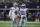 Dallas Cowboys quarterback Dak Prescott (4) and running back Ezekiel Elliott (21) during the second half of an NFL football game against the Washington Redskins in Arlington, Texas, Sunday, Dec. 15, 2019. (AP Photo/Ron Jenkins)