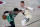 Boston Celtics' Marcus Smart, left, drives around Milwaukee Bucks' Donte DiVincenzo during the second half of an NBA basketball game Friday, July 31, 2020, in Lake Buena Vista, Fla. (AP Photo/Ashley Landis, Pool)