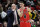 Chicago Bulls coach Jim Boylen talks with guard Zach LaVine during the first half of the team's NBA basketball game against the Charlotte Hornets in Chicago, Thursday, Feb. 20, 2020. (AP Photo/Nam Y. Huh)
