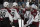Colorado Avalanche goalie Pavel Francouz, right, is congratulated by teammates Vladislav Namestnikov (90) Nathan MacKinnon (29) and Gabriel Landeskog (92) at the end of an NHL hockey game against the San Jose Sharks Sunday, March 8, 2020, in San Jose, Calif. (AP Photo/Ben Margot)
