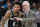 San Antonio Spurs head coach Gregg Popovich, right, talks with guard Dejounte Murray during the second half of an NBA basketball game against the Indiana Pacers, Monday, March 2, 2020, in San Antonio. (AP Photo/Darren Abate)