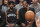 FILE - In this Nov. 1, 2019, file photo, Brooklyn Nets' Kyrie Irving, left, and Kevin Durant watch the game action from the bench during the second half of an NBA basketball game against the Houston Rockets in New York. With so much uncertainty around the NBA season, Brooklyn Nets general manager Sean Marks is no longer ruling Kevin Durant out for the season. Marks had repeatedly said he didn't expect Durant to play this season while recovering from Achilles tendon surgery, but he acknowledged Wednesday that everything is unknown now that the season is suspended because of the new coronavirus. Even Kyrie Irving, who had shoulder surgery on March 3, might be available if play stretched into the summer. (AP Photo/Mary Altaffer, File)