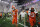 Clemson quarterback Trevor Lawrence, left, leaves the field after a NCAA College Football Playoff national championship game against LSU, Monday, Jan. 13, 2020, in New Orleans. LSU won 42-25.(AP Photo/Gerald Herbert)