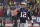 FILE - In this Saturday, Jan. 4, 2020 file photo, New England Patriots quarterback Tom Brady walks to the sideline after throwing an interception late in the second half of an NFL wild-card playoff football game against the Tennessee Titans in Foxborough, Mass. Nearly every one of the NFL's eight divisions has a team or teams with a quarterback quandary. With the exception of the NFC West it's easy to argue that there's a major hole behind center somewhere. Yep, after two decades of unmatched success, Tom Brady is without a contract. (AP Photo/Bill Sikes, File)