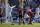 Members of the Akron team, in white, celebrate a goal by Scott Caldwell as Louisville goalkeeper Andre Boudreaux, second from left, and other member of the Louisville team reacts during the second half of an NCAA college soccer match, Sunday, Dec. 12, 2010, in Santa Barbara, Calif. Akron won 1-0.  (AP Photo/Mark J. Terrill)