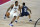 Los Angeles Clippers' Kawhi Leonard (2) drives around Dallas Mavericks' Trey Burke (32) during the first half of an NBA basketball game Thursday, Aug. 6, 2020 in Lake Buena Vista, Fla. (AP Photo/Ashley Landis, Pool)