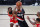 Portland Trail Blazers' Damian Lillard handles the ball against Houston Rockets' James Harden, left, during the second half of an NBA basketball game Tuesday, Aug. 4, 2020, in Lake Buena Vista, Fla. (Kevin C. Cox/Pool Photo via AP)