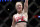 FILE - In this July 23, 2016, file photo, Valentina Shevchenko, of Kyrgyzstan, gestures after defeating Holly Holm during a women's bantamweight mixed martial arts bout at United Center in Chicago. Shevchenko is a Soviet-born Peruvian from Kyrgyzstan who does her mixed martial arts training in Thailand and the U.S. This avid traveler, dance contest winner and recent restaurant shooting survivor also might be the UFC's new bantamweight champion after her rematch with Amanda Nunes on Saturday, July 8, 2017. (AP Photo/Nam Y. Huh, File)