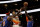 Atlanta Hawks forward John Collins (20) battles New York Knicks forward Julius Randle (30) as he drives to the basket during the first half of an NBA basketball game Wednesday, March 11, 2020, in Atlanta. (AP Photo/John Bazemore)