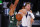 Dallas Mavericks' Luka Doncic, right, passes against Milwaukee Bucks' Giannis Antetokounmpo, left, during an NBA basketball game Saturday, Aug. 8, 2020, in Lake Buena Vista, Fla. (Kevin C. Cox/Pool Photo via AP)