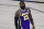 Los Angeles Lakers forward LeBron James pauses during the first quarter of the team's NBA basketball game against the Indiana Pacers on Saturday, Aug. 8, 2020, in Lake Buena Vista, Fla. (Kim Klement/Pool Photo via AP)