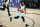Miami Heat forward Jimmy Butler (22) dribbles against the Indiana Pacers during the first half of an NBA basketball game Monday, Aug. 10, 2020, in Lake Buena Vista, Fla. (Kim Klement/Pool Photo via AP)