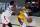 Los Angeles Lakers' LeBron James passes around Toronto Raptors' OG Anunoby (3) during the second half of an NBA basketball game Saturday, Aug. 1, 2020, in Lake Buena Vista, Fla. (AP Photo/Ashley Landis, Pool)