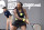 Serena Williams returns a shot to her sister Venus Williams during the WTA tennis tournament in Nicholasville, Ky., Thursday, Aug. 13, 2020. (AP Photo/Timothy D. Easley)