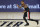 Portland Trail Blazers guard Damian Lillard reacts after making a 3-point basket against the Dallas Mavericks during the second half of an NBA basketball game Tuesday, Aug. 11, 2020, in Lake Buena Vista, Fla. (Kim Klement/Pool Photo via AP)