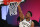 Milwaukee Bucks forward Giannis Antetokounmpo (34) scores a basket against the Miami Heat during the first half of an NBA basketball game Thursday, Aug. 6, 2020, in Lake Buena Vista, Fla. (Kim Klement/Pool Photo via AP)