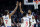 Los Angeles Clippers' Paul George, right, celebrates with teammate Kawhi Leonard (2) after scoring against the San Antonio Spurs during the second half of an NBA basketball game, Monday, Feb. 3, 2020, in Los Angeles. The Clippers won 108-105. (AP Photo/Ringo H.W. Chiu)
