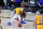 Los Angeles Lakers forward LeBron James (23) battles against Portland Trail Blazers guard Damian Lillard during the first half of an NBA basketball game Tuesday, Aug. 18, 2020, in Lake Buena Vista, Fla. (AP Photo/Ashley Landis, Pool)
