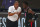 Los Angeles Clippers head coach Doc Rivers (left) talks with guard Reggie Jackson (1) during the second half of Game 2 of an NBA basketball first-round playoff series, Wednesday, Aug. 19, 2020, in Lake Buena Vista, Fla. (Kim Klement/Pool Photo via AP)