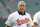 FILE - In this Aug. 9, 2019, file photo, former Baltimore Orioles infielder Cal Ripken, Jr. attends an on-field ceremony honoring the 1989 Orioles team prior to a baseball game against the Houston Astros, in Baltimore. Cal Ripken Jr. has launched a campaign to help feed children and families across the country during the COVID-19 pandemic, coordinating a contribution of $250,000 and opening a social media account for the first time to promote the cause.(AP Photo/Julio Cortez, File)