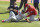 Philadelphia Phillies pitcher Jose Alvarez is helped after being hit by a ball hit by Toronto Blue Jays' Lourdes Gurriel Jr. during the fifth inning of the first game of a baseball doubleheader, Thursday, Aug. 20, 2020, in Buffalo, N.Y. (AP Photo/Jeffrey T. Barnes)