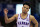 FILE - In this March 4, 2020, file photo, Kansas guard Devon Dotson celebrates a 3-point basket during the second half of the team's NCAA college basketball game against TCU in Lawrence, Kan. Dotson is entering the NBA draft after leading the Big 12 Conference in scoring his sophomore season. “In basketball, this has always been my ultimate dream and my time at KU has prepared me,” Dotson said Monday, April 13, 2020, in a news release.(AP Photo/Orlin Wagner, File)