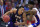 TCU guard Desmond Bane (1) drives on Kansas guard Ochai Agbaji during the first half of an NCAA college basketball game in Lawrence, Kan., Wednesday, March 4, 2020. (AP Photo/Orlin Wagner)