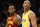 Los Angeles Lakers' Kobe Bryant, right, and Cleveland Cavaliers' LeBron James, left, are seen on the court together during the first half of an NBA basketball game, Thursday, March 10, 2016, in Los Angeles. (AP Photo/Danny Moloshok)