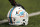 A Miami Dolphins helmets sits on the field before an NFL football game against the New York Giants, Sunday, Dec. 15, 2019, in East Rutherford, N.J. (AP Photo/Adam Hunger)