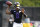 Baltimore Ravens quarterback Lamar Jackson works out during an NFL football camp practice, Monday, Aug. 17, 2020, in Owings Mills, Md. (AP Photo/Julio Cortez)