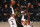 Portland Trail Blazers guard Gary Trent Jr. (2) and center Hassan Whiteside (21) defend against Los Angeles Lakers forward LeBron James (23) in the first half of Game 4 of an NBA basketball first-round playoff series, Monday, Aug. 24, 2020, in Lake Buena Vista, Fla. (Kim Klement/Pool Photo via AP)
