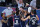Dallas Mavericks' Luka Doncic, center, celebrates with teammates after making a game-winning 3-point basket against the Los Angeles Clippers during overtime of an NBA basketball first round playoff game Sunday, Aug. 23, 2020, in Lake Buena Vista, Fla. The Mavericks won 135-133 in overtime. (AP Photo/Ashley Landis, Pool)